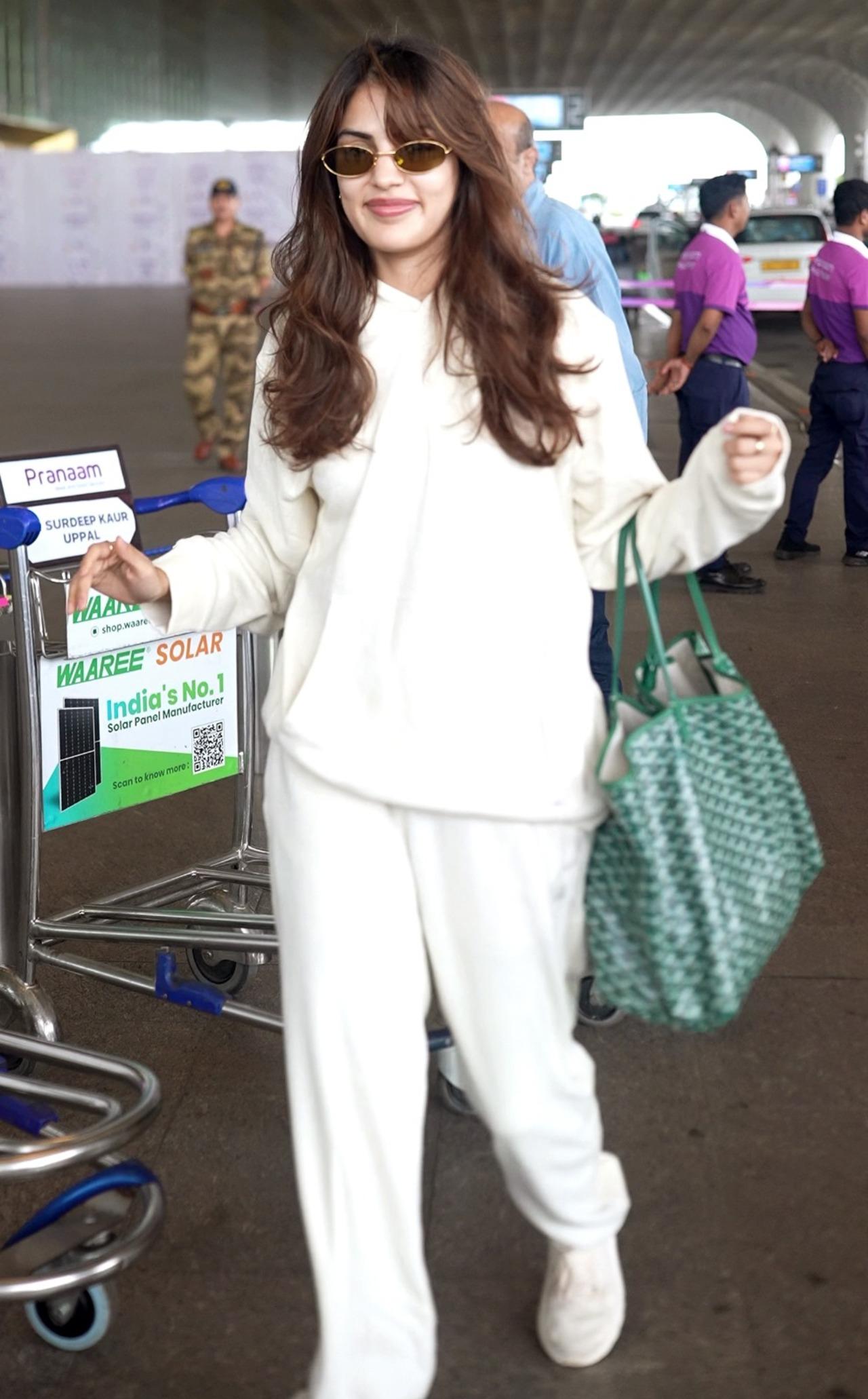 Rhea Chakraborty looked effortlessly stylish in an all-white co-ord set comprising an oversized hoodie and matching joggers.